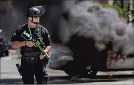  ?? Kent Nishimura Los Angeles Times ?? PROJECTILE weapons fired by LAPD personnel during last spring’s protests caused serious injuries, The Times found. Restrictio­ns on their use are in place.