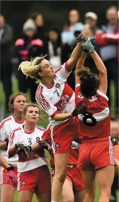  ??  ?? Ciara McGurk of Derry in action against Sinead Woods of Louth.