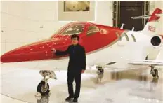  ?? Reuters ?? Fujino with Honda Motor’s HondaJet at the company’s plant in Greensboro, North Carolina. The jet began deliveries in late 2015.