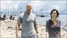  ?? WARNER BROS. PICTURES ?? Dwayne Johnson and Carla Gugino survey the destructio­n in“San Andreas.”