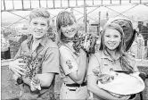  ?? CHARLES SYKES THE ASSOCIATED PRESS ?? Robert, left, Terri and Bindi Irwin have a new Animal Planet show "Crikey! It's The Irwins" premiering Sunday.