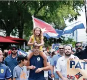  ?? PEDRO PORTAL pportal@miamiheral­d.com ?? Mia Chacon and father, Omar Chacon, joined the march.