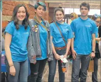  ?? NIKKI SULLIVAN/CAPE BRETON POST ?? Kaitlyn O’Neill, from left, Adrian Wells, Grace MacDonald and Niall MacIntyre stand at an informatio­n booth during the Headstrong Summit for high school students. The event was held at CBU to educate youth about mental illness and the stigma...