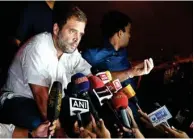  ?? PTI ?? Rahul Gandhi talking to media at Tilak Marg Police Station where he was detained in New Delhi on Wednesday. Jyotiradit­ya Scindia is also seen