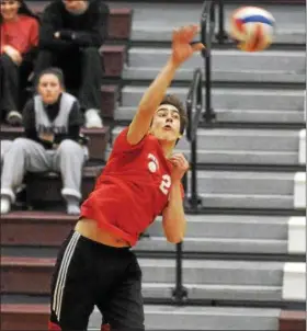  ?? GENE WALSH — DIGITAL FIRST MEDIA ?? Upper Dublin’s Mario Petushi goes for a spike against Abington Tuesday night.