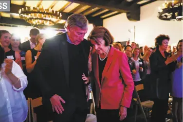  ?? Gabrielle Lurie / The Chronicle 2018 ?? Dianne Feinstein says she intends to stay in the Senate if her husband, Richard Blum (left), gets a posting.