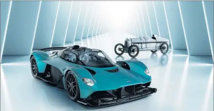  ?? ?? JOURNEY: Aston Martin has released photograph­s of one of its oldest surviving race cars, the recordbrea­king 1923 Razor Blade, alongside the forthcomin­g Valkyrie hypercar to mark its 110-year milestone.