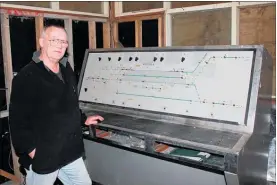  ??  ?? By the control panel he used to operate, Paul Keen from Woodville.