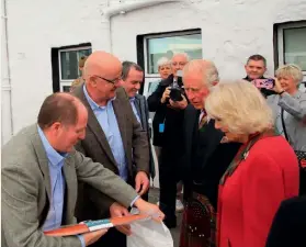  ?? ?? Above: Alex McInnes (left) meets the Duke and Duchess of Rothesay
