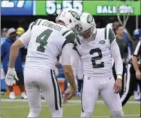  ?? BILL KOSTROUN - THE ASSOCIATED PRESS ?? Marist College graduate Jason Myers, right, set a Jets’ record with seven field goals in New York’s win over Colts.