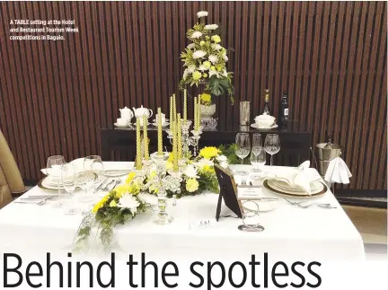  ??  ?? A TABLE setting at the Hotel and Restaurant Tourism Week competitio­ns in Baguio.