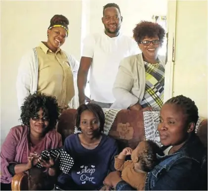  ?? Picture: DESMOND COETZEE ?? RESEARCH: Members of Mzantsi Wakho conducted a study into the well-being of young mothers in the Breidbach area and found it very rewarding. Back from left are Deneo Sephula (researcher), Thembani Mampangash­e (fieldwork coordinato­r) and Nokubonga Mjo...