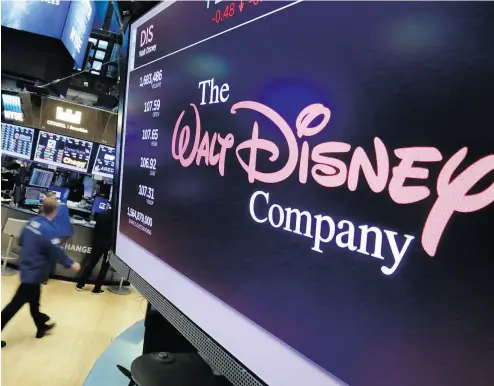  ?? RICHARD DREW / THE ASSOCIATED PRESS FILES ?? Bristol Gate Concentrat­ed U. S. Equity ETF, run by artificial intelligen­ce, includes Walt Disney Co. among its holdings. More and more ETFs are using AI to analyze the optimum mix of stocks for investors.