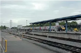  ?? ?? The north end of the cleaning and stabling sidings looking towards the fuelling area and wash plant. Three-car CrossCount­ry Class 170 No. 170638 awaits its next duties alongside XC ‘Voyager’ No. 221125.