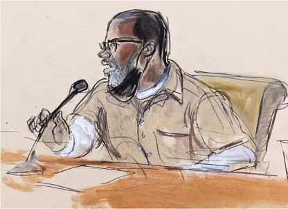  ?? AP ?? In this courtroom sketch, R. Kelly briefly addresses Judge Ann Donnelly during his sentencing in federal court, Wednesday, in New York. R. Kelly was sentenced to 30 years in prison for using his superstard­om to subject young fans — some just children — to systematic sexual abuse.