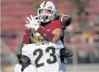  ?? Jeff Chiu, The Associated Press ?? Colorado safety Isaiah Lewis breaks up a pass intended for Stanford wide receiver Simi Fehoko, top, during the first half of their Nov. 14 game in Stanford, Calif.