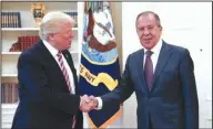  ?? Russian Foreign Ministry/AP ?? Meeting: This handout photo released by the Russian Ministry of Foreign Affairs, shows President Donald Trump meeting with Russian Foreign Minister Sergey Lavrov in the Oval Office of the White House in Washington on May 10, 2017.