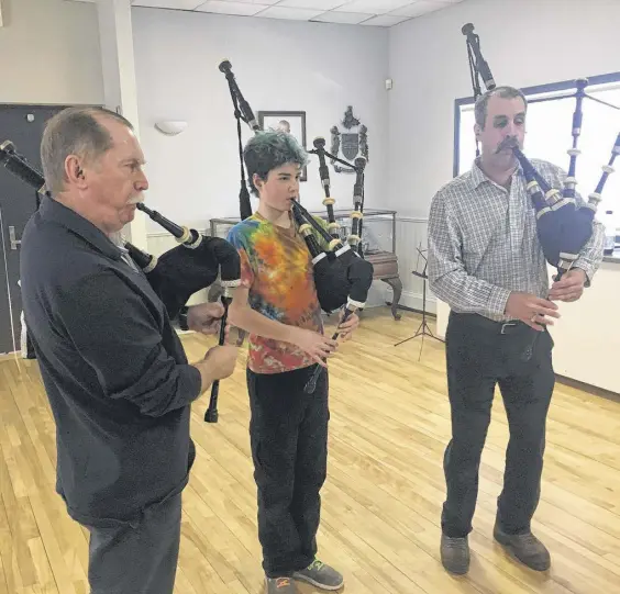  ??  ?? Pipers gather at least once a week at the College of Piping in Summerside, P.E.I., to practise together. Dr. Robert Mckay, left, describes it as similar to a family atmosphere.