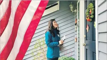  ?? Photograph­s by Mark Z. Barabak Los Angeles TImes ?? JINYOUNG ENGLUND, who is running for state Senate in Washington, estimates she has rung 17,000 doorbells in her campaign. The Republican says the race is about “one-party control and what does that mean.”