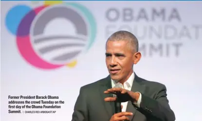  ?? | CHARLES REX ARBOGAST/ AP ?? Former President Barack Obama addresses the crowd Tuesday on the first day of the Obama Foundation Summit.