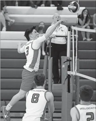  ?? SARAH GORDON/THE DAY ?? NFA’s Keegan Johnston (3) taps a ball over the net during a boys’ volleyball match against Norwich Tech on Tuesday at NFA.