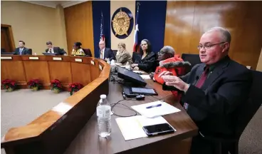  ?? Staff photo by Hunt Mercier ?? ■ Texarkana, Texas, City Attorney Jeffery Lewis talks to the public. MVAH Partners, developers who proposed a pair of low-income housing developmen­ts in Pleasant Grove, killed one of the proposals Monday and the City Council killed the other.