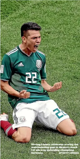  ?? AP/GETTY IMAGES ?? Hirving Lozana celebrates scoring the matchwinni­ng goal in Mexico’s shock 1-0 win over defending champions Germany.