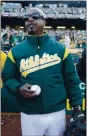  ?? NHAT V. MEYER — STAFF ?? Rapper MC Hammer waits to throw out the first pitch before an A’s playoff game in 2019 at the Coliseum.