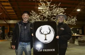  ?? PHOTO: SANDY EGGLESTON ?? Getting ready . . . New Zealand Country Music Festival trustee Roger Bowie, of Auckland, and Bayleys Tussock Country event coordinato­r Annabel Roy help prepare the Gore Town and Country Club stadium for tonight’s Top Paddock concert.