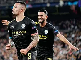  ??  ?? Euro star: Jesus celebrates with Mahrez after scoring in City’s win at the Bernabeu