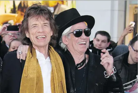  ?? JOEL RYAN/THE ASSOCIATED PRESS ?? Rolling Stones bandmates Mick Jagger, left, and Keith Richards have known each since they were young children and despite some strained moments, their friendship and their partnershi­p remains strong and shows no sign of abating.