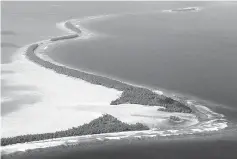  ??  ?? File photo shows the coastline of Funafuti, an atoll of Tuvalu. President of the Assembly of French Polynesia Marcel Tuihani expressed his ‘stupefacti­on’ after Trump’s decision to withdraw from the Paris climate accord. — AFP photo