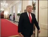  ?? YURI GRIPAS/ABACAPRESS ?? President Donald Trump arrives to deliver remarks in the East Room of the White House in Washington on Nov. 6.