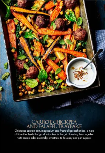  ??  ?? Carrot, chickpea and falafel traybake
Chickpeas contain iron, magnesium and fructo-oligosacch­arides, a type of fibre that feeds the ‘good’ microbes in the gut. Roasting them together with carrots adds a crunchy sweetness to this easy one-pan supper.