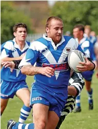  ?? ?? PUSHING FORWARD:
Images of the players, squads and matches of the East Hull Rugby League team. Pictured here from the open day held at West Hull rugby league team ground on North Road in August, 2004. Here Phil Colclough pushes forward for East Hull during their match against
West Hull. Look out for more images of the East Hull club in Thursday’s Daily Flashback pages.