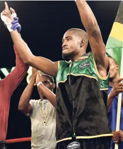  ?? GLADSTONE TAYLOR/PHOTOGRAPH­ER ?? Kemahl “Hitman” Russell celebratin­g his knockout win over Nigel Edwards on July 26 at the Mico University College.