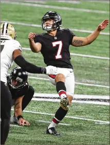  ?? CURTIS COMPTON/ CURTIS. COMPTON@ AJC. COM ?? Kicking is “just muscle memory at this point,” Younghoe Koo said. “Just kind of kicking to the ( middle), getting in a good groove, getting into a good rhythm and just carrying that on to the field when my name is called.”