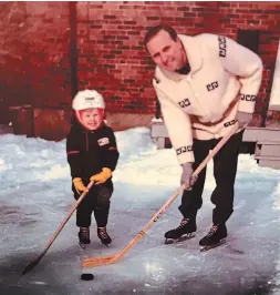  ?? PHOTO COURTESY OF SCOTT RADLEY ?? Scott Radley and his dad, Ron, on the backyard rink in the winter of 1970.