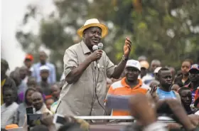  ?? Ben Curtis / Associated Press ?? Opposition leader Raila Odinga addresses supporters in Nairobi, Kenya. He had petitioned the court over the election results, claiming manipulati­on.