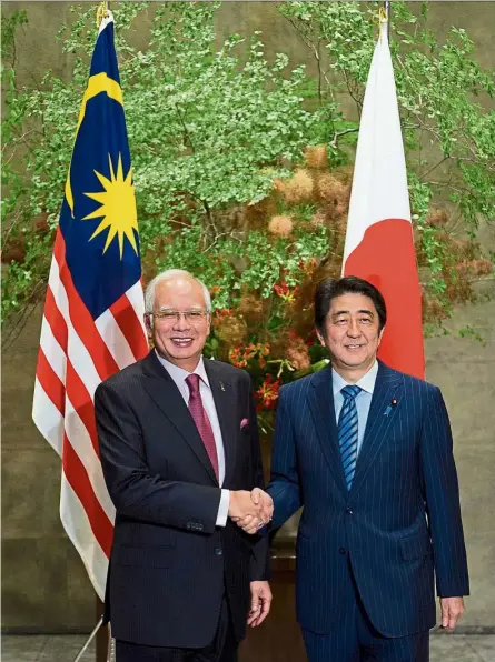 ??  ?? Renewing ties: Najib (left) and Abe have agreed to embark on a second wave of the LEP (LEP 2.0). — Bernama