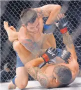  ?? JIM THOMPSON/JOURNAL FILE ?? Albuquerqu­e’s Ray Borg, top, has had issues in the past with making weight.