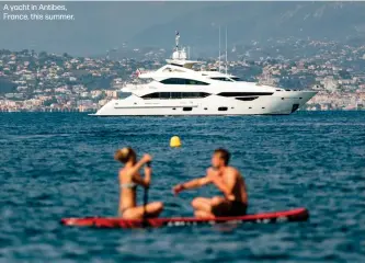  ??  ?? A yacht in Antibes, France, this summer.