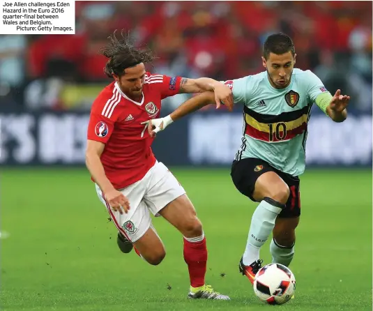  ??  ?? Joe Allen challenges Eden Hazard in the Euro 2016 quarter-final between Wales and Belgium.
Picture: Getty Images.