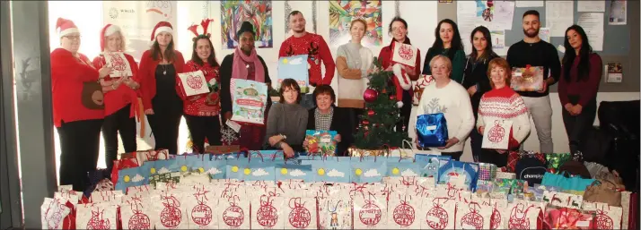  ??  ?? VTOS year one students with gift bags for the homeless with their teachers, Fiona Wickham, Miriam O’ Sullivan, Teresa Wemyss VTOS co-ordinator and May Jordan adult literacy co-ordinator.