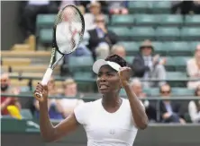  ?? Tim Ireland / Associated Press ?? Venus Williams is a win away from possibly playing sister Serena for the Wimbledon championsh­ip — for a fifth time.
