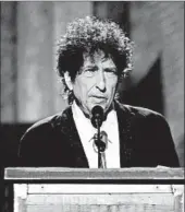  ?? KEVIN MAZUR/WIREIMAGE 2015 ?? Bob Dylan will not travel to Stockholm to receive his Nobel Prize next month, the Swedish Academy says.