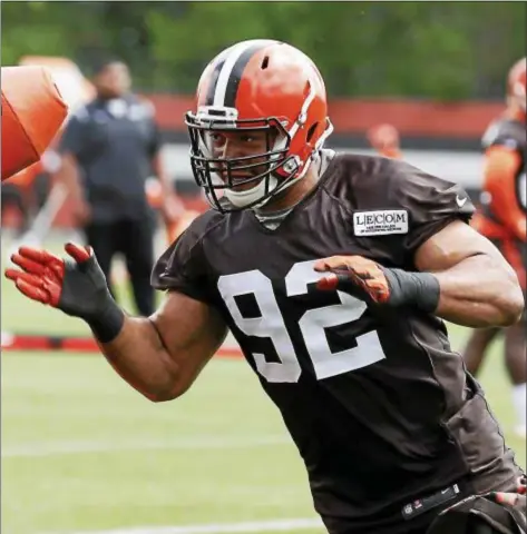  ?? ASSOCIATED PRESS ?? Browns defensive end Desmond Bryant goes through drills at an OTA in Berea on June 6.