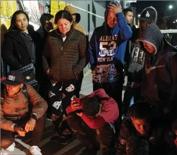  ?? Photo: Nampa/AFP ?? Devastatin­g blaze…Migrants take part in a vigil outside Mexican immigratio­n facilities, where at least 38 migrants died in a fire, in Ciudad Juarez, Chihuahua state, on Tuesday.