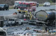  ?? CHRISTOPHE­R KATSAROV / THE CANADIAN PRESS ?? Transport trucks and fuel carriers were involved in the crash that sent fuel “rolling down the highway.”