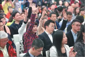  ?? XING GUANGLI / XINHUA ?? Reporters hope to be called on at a news conference for the first session of the 13th National Committee of the Chinese People’s Political Consultati­ve Conference at the Great Hall of the People in Beijing. The session begins on Saturday.